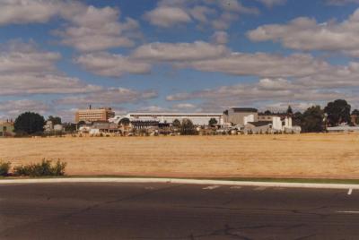 PHOTOGRAPH: VIEW OVER UNDEVELOPED SUBI CENTRO SITE