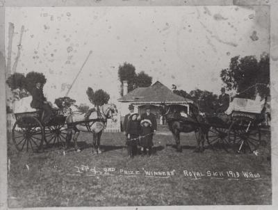 PHOTOGRAPH (COPY): BURNS BAKERY DELIVERY CARTS AND FAMILY