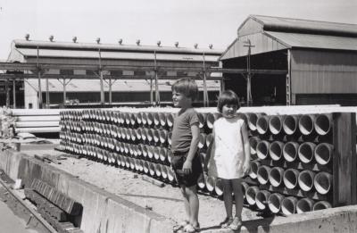 PHOTOGRAPH: HUMES CHILDREN BESIDE PIPES