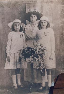 PHOTOGRAPH: FORMALLY DRESSED MOTHER WITH TWO DAUGHTERS