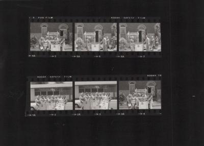 PHOTOGRAPH (PROOF SHEET): V.A.D. LADIES WITH DISPLAY BOARD IN FRONT OF MUSEUM, 1976