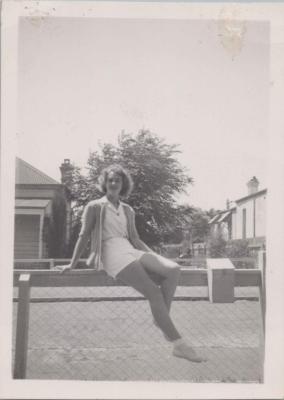 PHOTOGRAPH: IRIS BEARD SITTING ON A FENCE IN SUBIACO