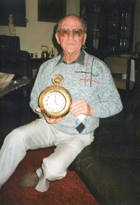 PHOTOGRAPH: BRISTILE POTTERY - GOLD CLOCK, MR VAN WERELD