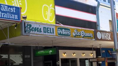 PHOTOGRAPH (DIGITAL): SIGN FOR BEN'S DELI ON FACE