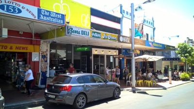 PHOTOGRAPH (DIGITAL): SIGN FOR BEN'S DELI ON FACE