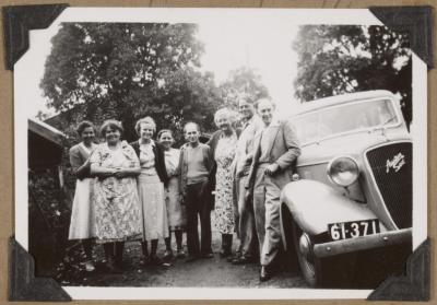 PHOTOGRAPH (DIGITAL): A GROUP OF PEOPLE STANDING BESIDE A CAR, FROM CONGDON FAMILY ALBUM