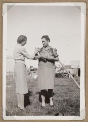 PHOTOGRAPH (DIGITAL): TWO WOMEN WITH BOTTLES AND GLASSES, FROM CONGDON FAMILY ALBUM