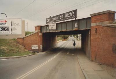 PHOTOGRAPH: LES BONSER STANDING UNDER THE HAY STREET SUBWAY, 1998