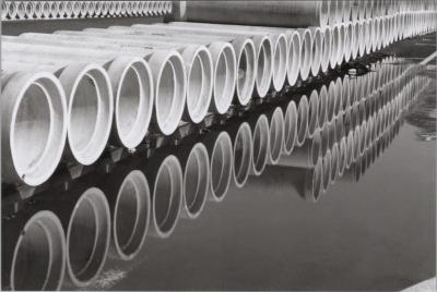 PHOTOGRAPH: ROWS OF PIPES REFLECTION, HUMES SITE, WELSHPOOL 1998