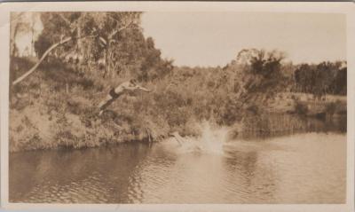 PHOTOGRAPH: SCOUTS DIVING INTO RIVER, SCOUTS BUSH CAMP