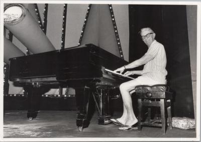 PHOTOGRAPH: PADDY BAKER PLAYING THE PIANO