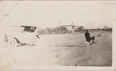 PHOTOGRAPH: MAN ON BICYCLE