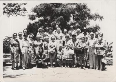 PHOTOGRAPH: PADDY BAKER WITH A GROUP OF PEOPLE