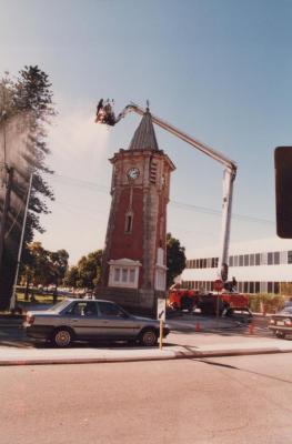 PHOTOGRAPH (DIGITAL): FALLEN SOLDIERS MEMORAL CLOCK TOWER, CLEANING OF THE CLOCK, 1988