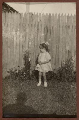 PHOTOGRAPH (DIGITAL): THELMA CONGDON IN A GARDEN, FROM CONGDON FAMILY ALBUM