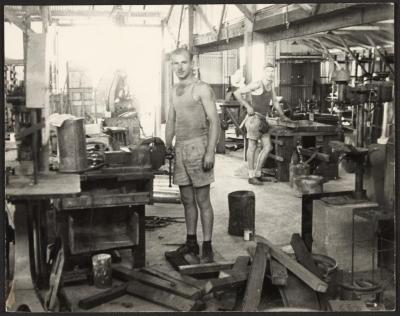 PHOTOGRAPH: DON AND COLIN ARCUS IN WORKSHOP