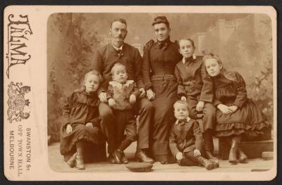 PHOTOGRAPH: FAMILY GROUP, PARENTS WITH FIVE CHILDREN, STUDIO IMAGE