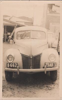 PHOTOGRAPH: BAKER'S PHOTO PLAYS VAN, FRONT VIEW