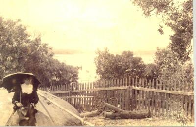 SHARKEY COLLECTION - WOMAN SEATED ON WELL COVER