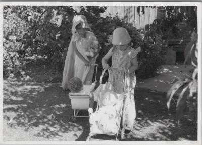 PHOTOGRAPH (DIGITAL): DIANNE AND JULIANNE BRAINE WITH THEIR DOLLS, CHRISTMAS 1964