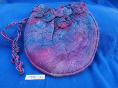reverse of machine embroidered bag