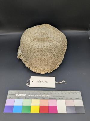 BONNET: BABY'S BONNET, CREAM SILK HAND CROCHETED, WITH RIBBONS