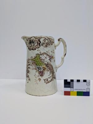JUG: MILK, BROWN ARABESQUE DECORATION