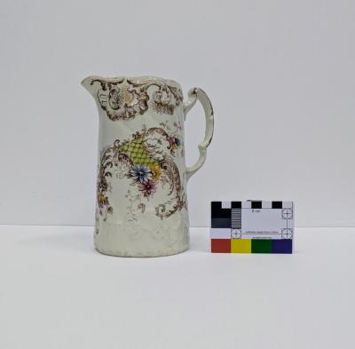 JUG: MILK, BROWN ARABESQUE DECORATION