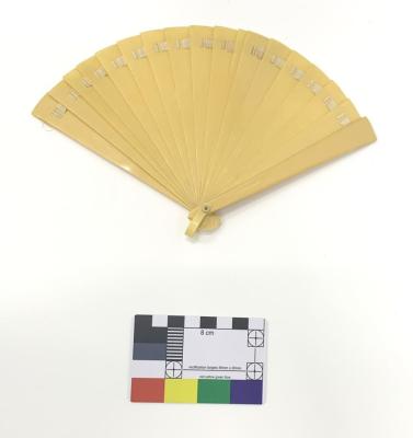 FAN: CELLULOID HAND FAN WITH SILK RIBBON INTERLACING AND TRIM AT HANDLE