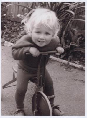 PHOTOGRAPH (DIGITAL): JUSTIN DIGGINS RIDING A TRICYCLE, 16 CHESTER STREET, SUBIACO