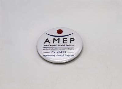 BADGE - ADULT MIGRANT ENGLISH PROGRAM