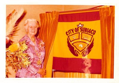 PHOTOGRAPH: COLOUR, EH PARKER WITH CITY OF SUBIACO BANNER