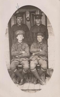 POSTCARD: FOUR MEN IN UNIFORM, FROM ALBUM 1, THELMA GREEN COLLECTION