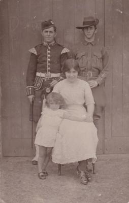 POSTCARD: FOUR PEOPLE, FROM ALBUM 1, THELMA GREEN COLLECTION