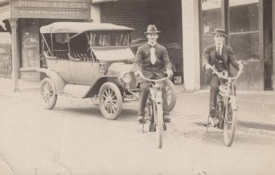 POSTCARD: TWO MEN ON BICYCLES, FROM ALBUM 1, THELMA GREEN COLLECTION