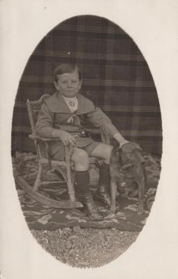 POSTCARD: UNKNOWN BOY AND DOG, FROM ALBUM 1, THELMA GREEN COLLECTION