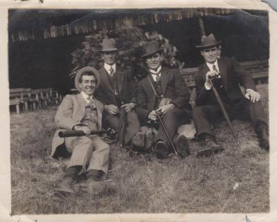 POSTCARD: FOUR MEN, FROM ALBUM 1, THELMA GREEN COLLECTION