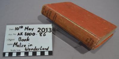 BOOK - MALICE IN WONDERLAND