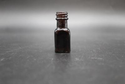 BOTTLE, MEDICINE - BLACK GLASS