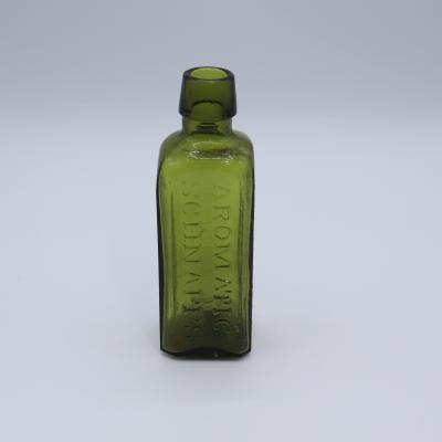 BOTTLE, GREEN GLASS - AROMATIC SCHNAPPS UDOLPHO WOLFE'S SCHIEDAM